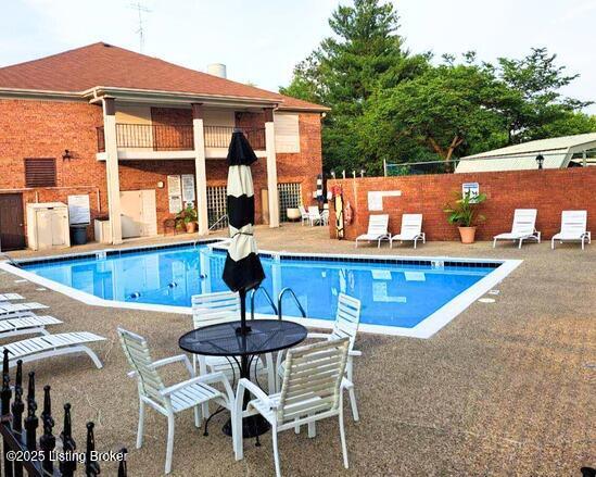 208 Forest Park Rd, Louisville, KY 40223 - community pool featuring a patio
