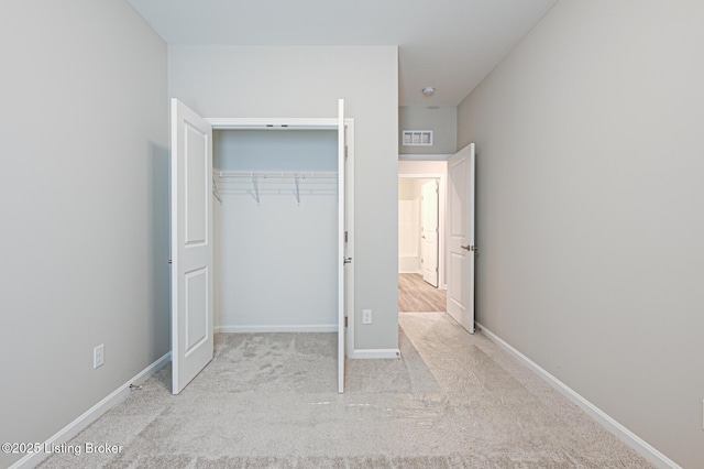 LOT14 Deer Vista Dr, Louisville, KY 40291 - unfurnished bedroom featuring carpet floors, a closet, and baseboards