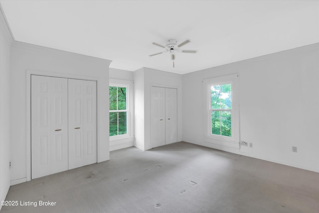 5212 Mary Clayton Ln, Crestwood, KY 40014 - unfurnished bedroom featuring multiple closets, carpet floors, and ceiling fan
