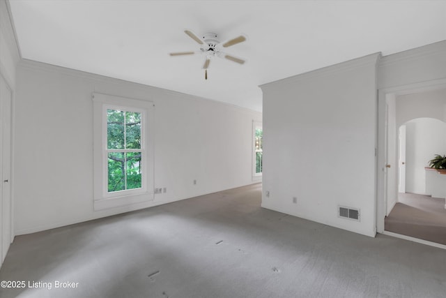 5212 Mary Clayton Ln, Crestwood, KY 40014 - empty room with crown molding, carpet, healthy amount of natural light, and arched walkways