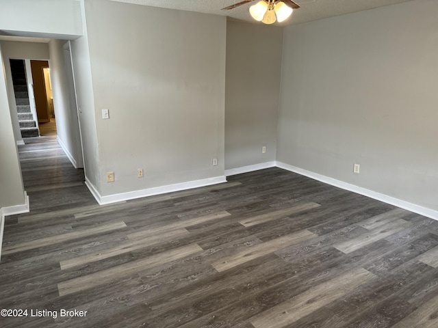 822 S Hancock St, Louisville, KY 40203 - unfurnished room featuring a ceiling fan, dark wood-style flooring, and baseboards