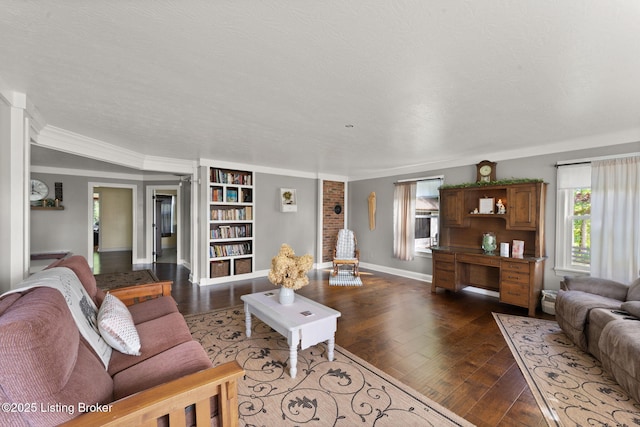 684 Cheslon Rd, Munfordville, KY 42765 - living room featuring baseboards, dark wood-style flooring, and ornamental molding