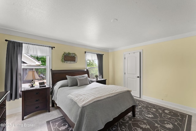 684 Cheslon Rd, Munfordville, KY 42765 - bedroom featuring baseboards and a textured ceiling
