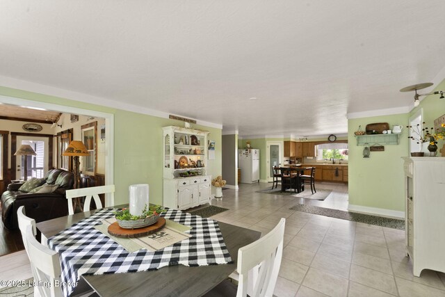 684 Cheslon Rd, Munfordville, KY 42765 - dining area featuring light tile patterned flooring and baseboards