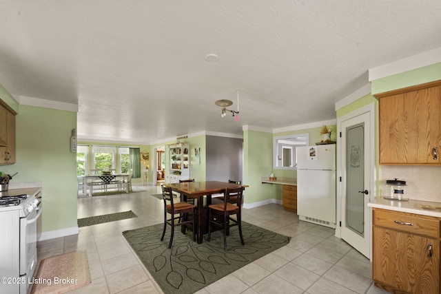 684 Cheslon Rd, Munfordville, KY 42765 - dining space with light tile patterned floors and baseboards