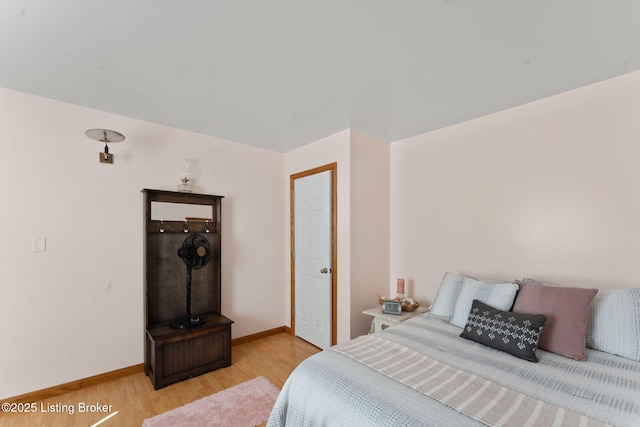684 Cheslon Rd, Munfordville, KY 42765 - bedroom with light wood-style flooring and baseboards