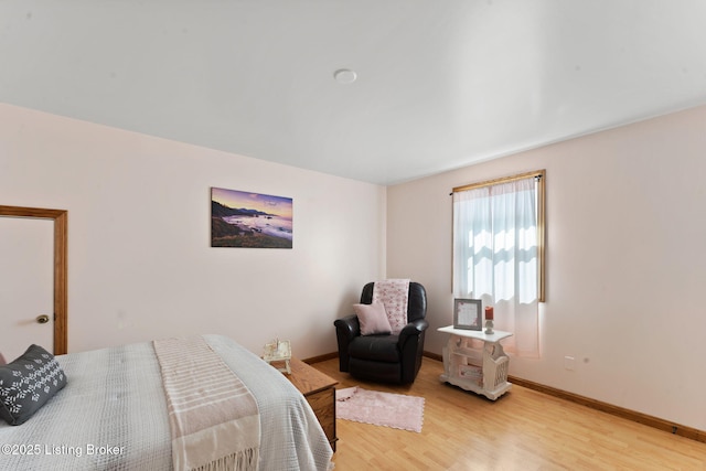 684 Cheslon Rd, Munfordville, KY 42765 - bedroom featuring light wood-style flooring and baseboards