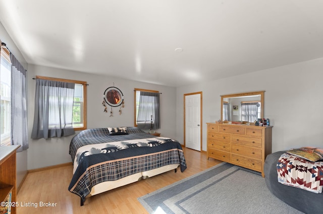 684 Cheslon Rd, Munfordville, KY 42765 - bedroom featuring wood finished floors and baseboards