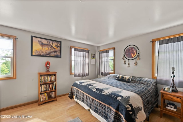 684 Cheslon Rd, Munfordville, KY 42765 - bedroom featuring light wood finished floors and baseboards