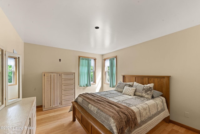 684 Cheslon Rd, Munfordville, KY 42765 - bedroom with light wood-type flooring and baseboards