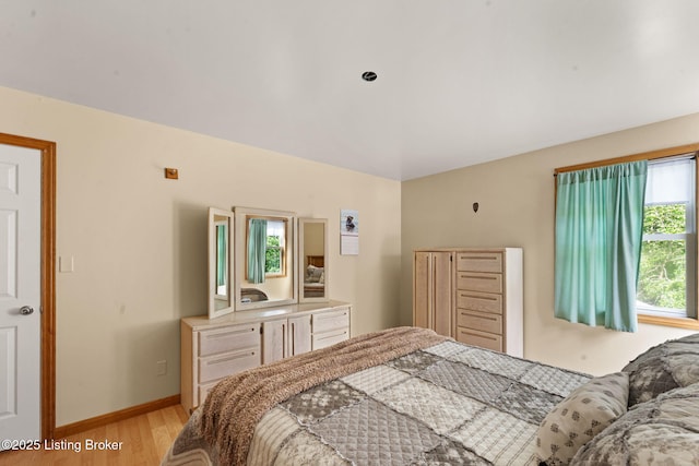 684 Cheslon Rd, Munfordville, KY 42765 - bedroom with light wood finished floors and baseboards