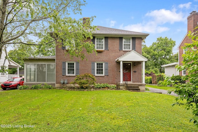 3308 Robin Rd, Louisville, KY 40213 - view of front of property featuring brick siding, a front yard, a chimney, and a shingled roof