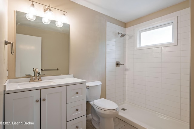 9707 Gateway Dr, Louisville, KY 40299 - full bathroom with toilet, vanity, and tiled shower