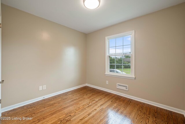 9707 Gateway Dr, Louisville, KY 40299 - spare room featuring baseboards and light wood-type flooring