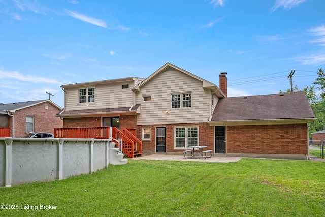 9707 Gateway Dr, Louisville, KY 40299 - rear view of house featuring brick siding, a chimney, a patio, and roof with shingles
