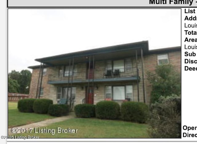 2310 Crums Ln, Louisville, KY 40216 - view of front of home with a balcony and a front lawn