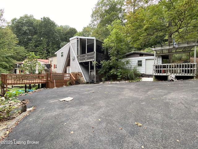 682 Hornback Mill Ln, Leitchfield, KY 42754 - a-frame style home with a deck