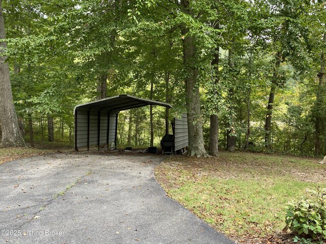 682 Hornback Mill Ln, Leitchfield, KY 42754 - view of outbuilding with driveway and a detached carport