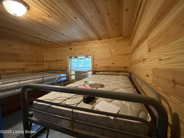 682 Hornback Mill Ln, Leitchfield, KY 42754 - bedroom with wooden ceiling and wood walls