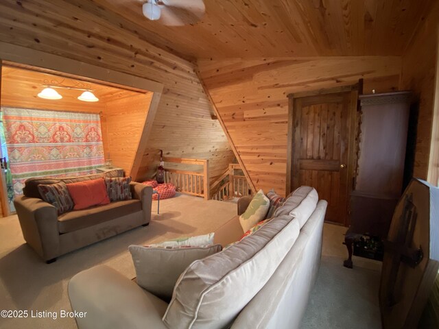 682 Hornback Mill Ln, Leitchfield, KY 42754 - carpeted living area with wooden walls, wood ceiling, a ceiling fan, and lofted ceiling