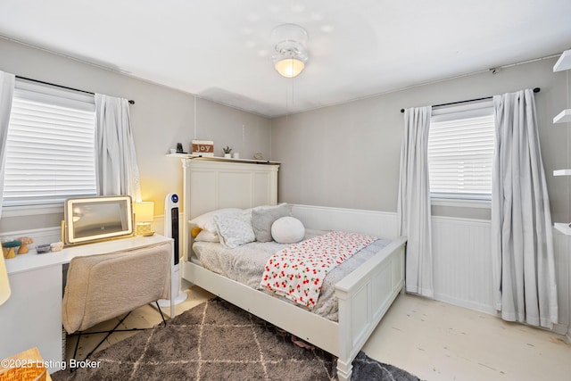 7513 Merlyn Cir, Louisville, KY 40214 - bedroom featuring multiple windows and wainscoting