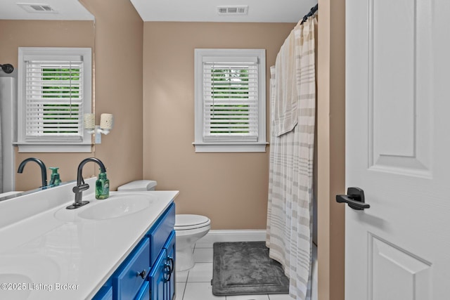 4011 Serendipity Ln, Louisville, KY 40272 - bathroom with double vanity, healthy amount of natural light, toilet, and baseboards
