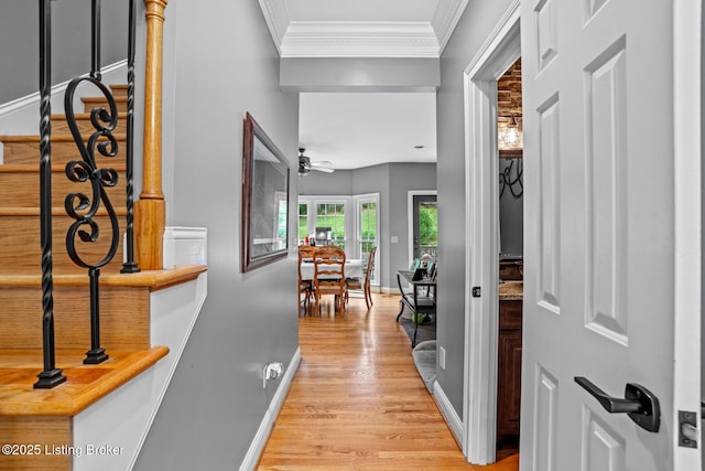 4011 Serendipity Ln, Louisville, KY 40272 - entryway featuring crown molding, light wood-type flooring, baseboards, and a ceiling fan