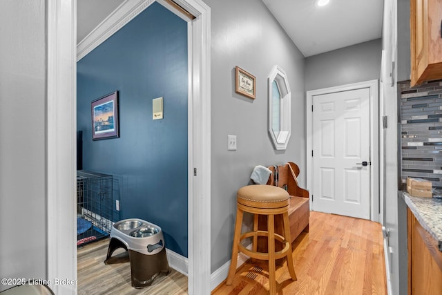4011 Serendipity Ln, Louisville, KY 40272 - bathroom with wood finished floors, vanity, baseboards, and backsplash