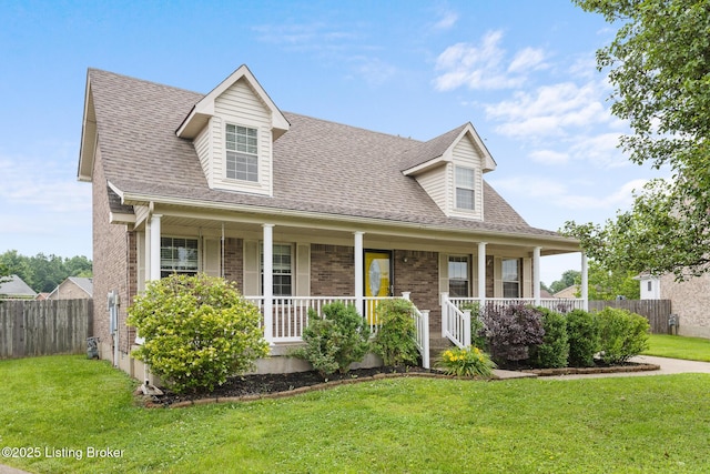 5704 Bartview Ct, Louisville, KY 40229 - cape cod home with brick siding, a porch, and a shingled roof