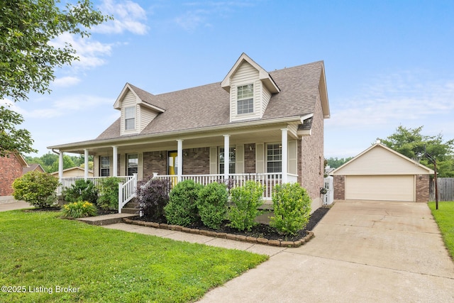 5704 Bartview Ct, Louisville, KY 40229 - cape cod-style house featuring roof with shingles, an outbuilding, a detached garage, and a front lawn