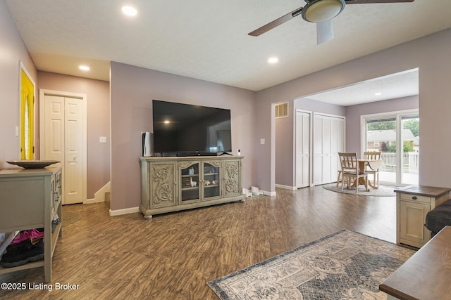 5704 Bartview Ct, Louisville, KY 40229 - living room featuring wood finished floors, ceiling fan, baseboards, and recessed lighting