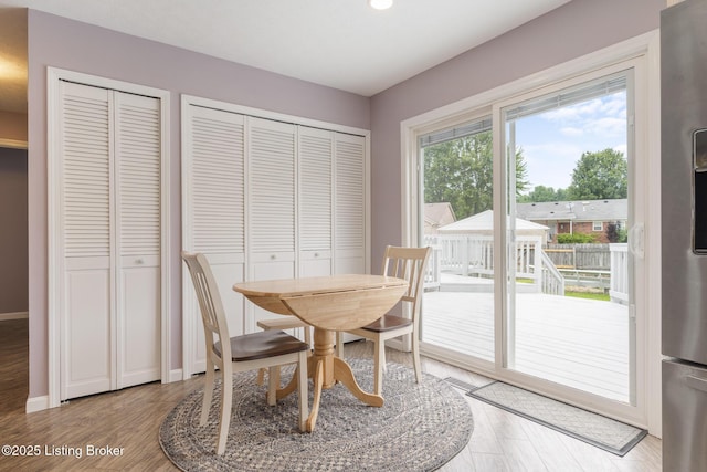 5704 Bartview Ct, Louisville, KY 40229 - dining room with light wood-type flooring, recessed lighting, and baseboards