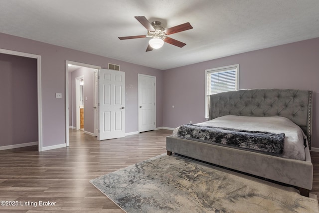 5704 Bartview Ct, Louisville, KY 40229 - bedroom with wood finished floors, baseboards, and a ceiling fan