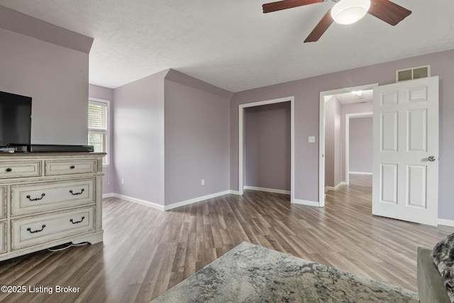 5704 Bartview Ct, Louisville, KY 40229 - unfurnished living room featuring light wood-type flooring, baseboards, and ceiling fan