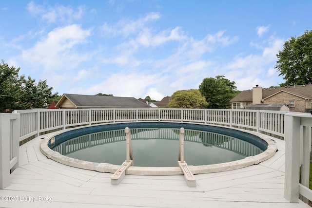 5704 Bartview Ct, Louisville, KY 40229 - outdoor pool with a wooden deck