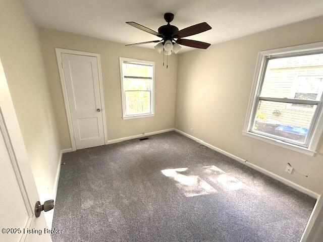 638 Gheens Ave, Louisville, KY 40214 - carpeted spare room with ceiling fan and baseboards