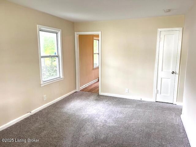 638 Gheens Ave, Louisville, KY 40214 - unfurnished room with carpet, baseboards, and a smoke detector