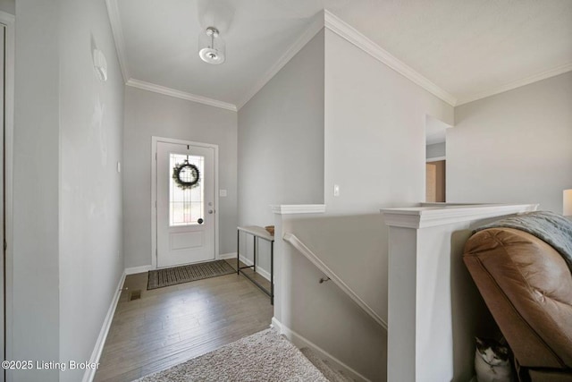 10905 Hidden Trail Ct, Louisville, KY 40229 - foyer featuring wood finished floors, crown molding, and baseboards