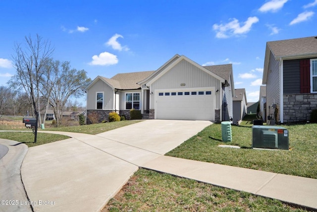 10905 Hidden Trail Ct, Louisville, KY 40229 - single story home featuring board and batten siding, stone siding, and a garage