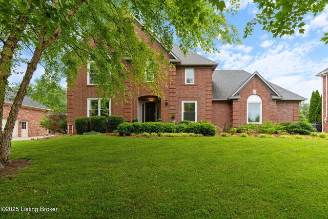 3908 Keal Run Way, Louisville, KY 40241 - view of front of home with brick siding, a front yard, and a shingled roof