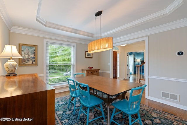 3908 Keal Run Way, Louisville, KY 40241 - dining space with wood finished floors, ornamental molding, and a tray ceiling