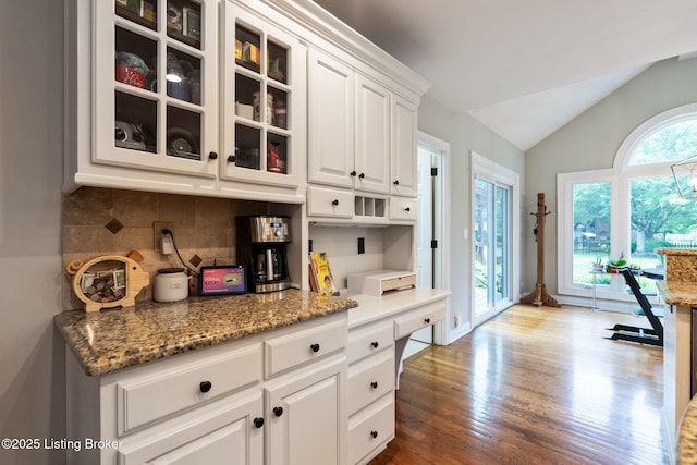 3908 Keal Run Way, Louisville, KY 40241 - kitchen featuring vaulted ceiling, backsplash, glass insert cabinets, white cabinetry, and wood finished floors