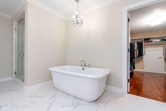 3908 Keal Run Way, Louisville, KY 40241 - bathroom with marble finish floors, crown molding, a freestanding bath, a walk in closet, and a shower stall