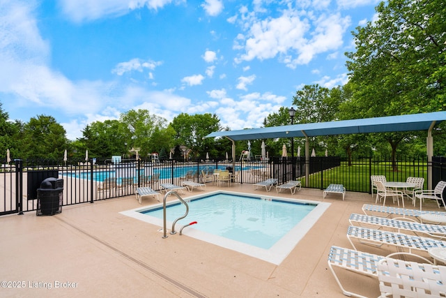 3908 Keal Run Way, Louisville, KY 40241 - community pool featuring a patio area and view of wooded area