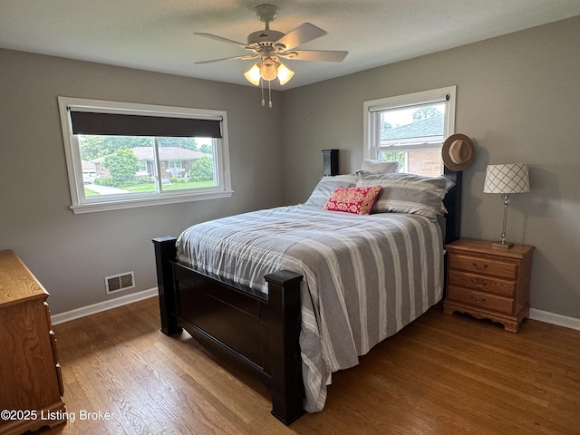 7005 Shareith Dr, Louisville, KY 40228 - bedroom featuring wood finished floors, baseboards, and ceiling fan