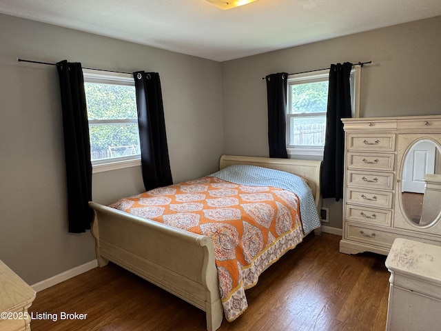 7005 Shareith Dr, Louisville, KY 40228 - bedroom with dark wood finished floors and baseboards