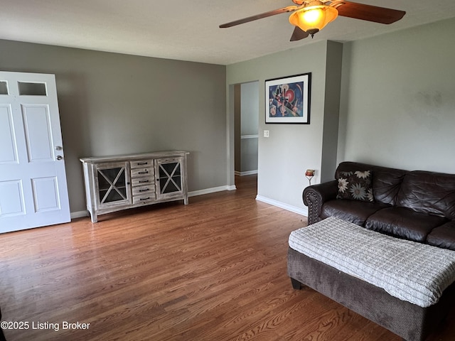 7005 Shareith Dr, Louisville, KY 40228 - living area with a ceiling fan, wood finished floors, and baseboards