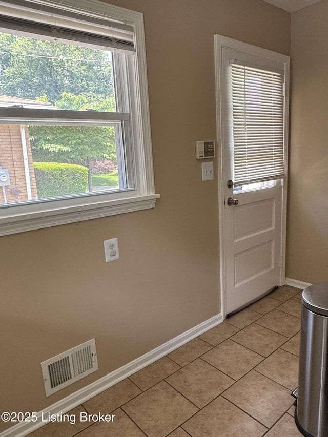 7005 Shareith Dr, Louisville, KY 40228 - entryway featuring baseboards and light tile patterned floors