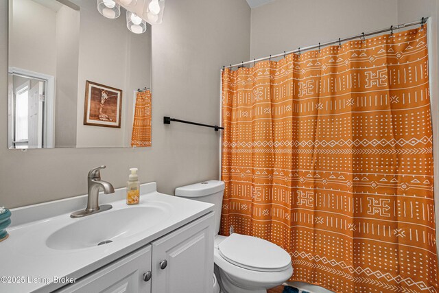 920 Lydia St, Louisville, KY 40217 - full bathroom with vanity and a shower with shower curtain