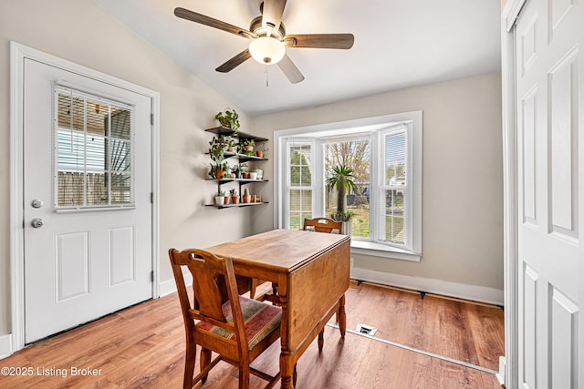 920 Lydia St, Louisville, KY 40217 - dining room with light wood-style floors, lofted ceiling, and ceiling fan